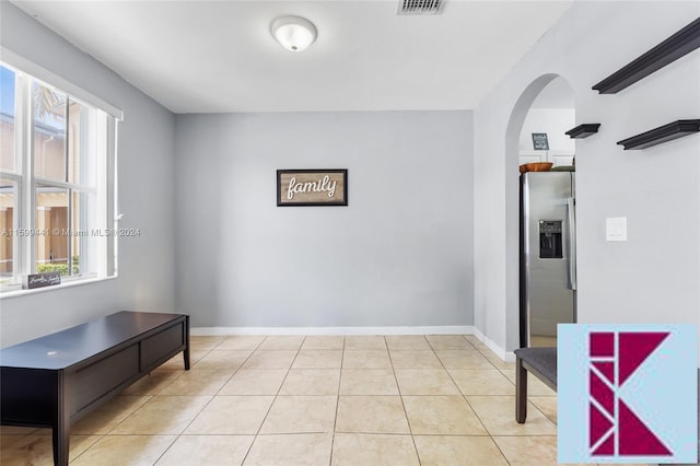 interior space with light tile patterned floors