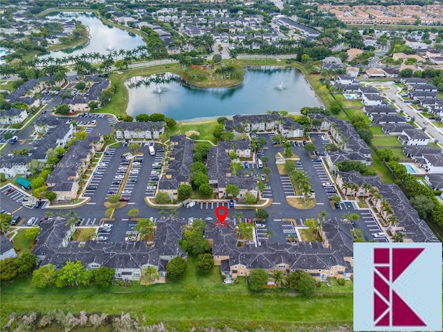 drone / aerial view with a water view