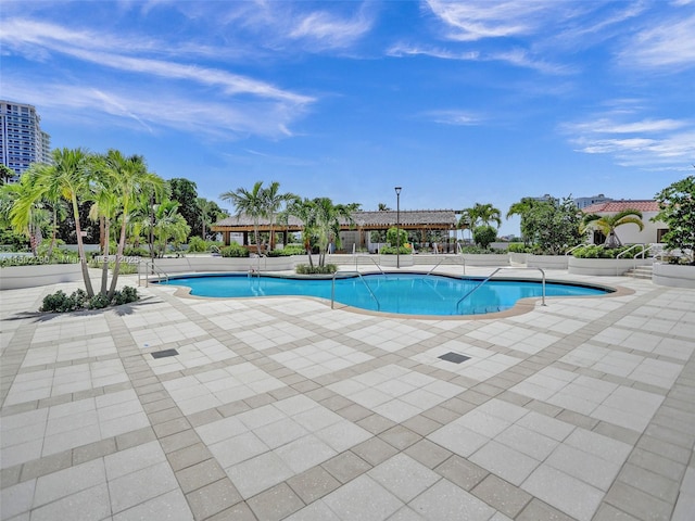 view of pool with a patio area