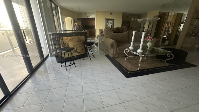 living room featuring light tile patterned flooring