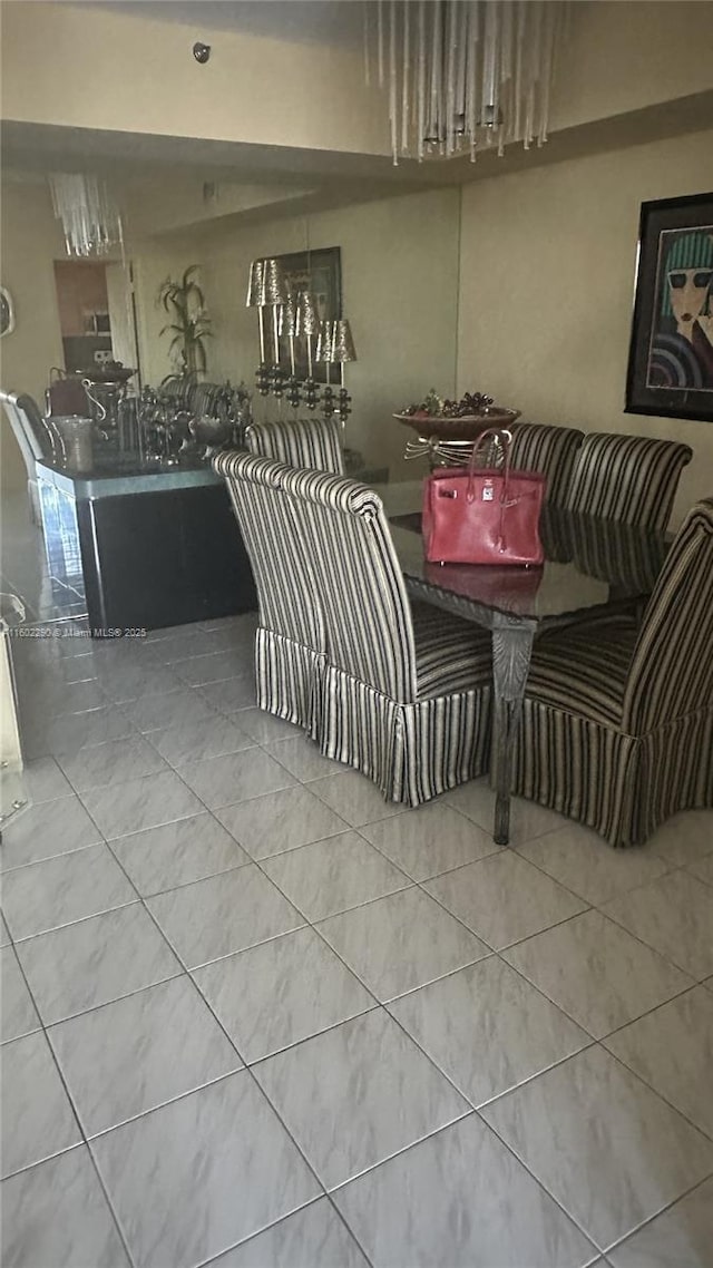 dining room with tile patterned floors