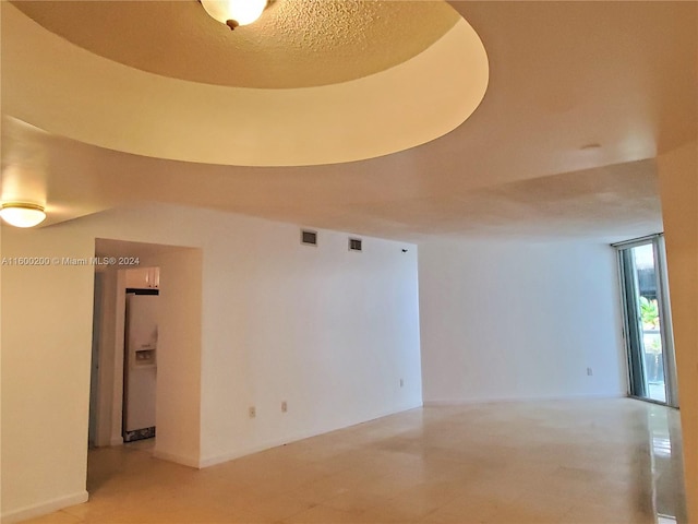 view of tiled spare room