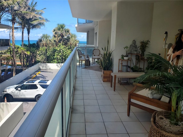 balcony featuring a water view