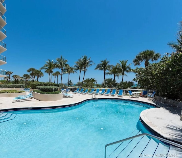 view of swimming pool featuring a patio