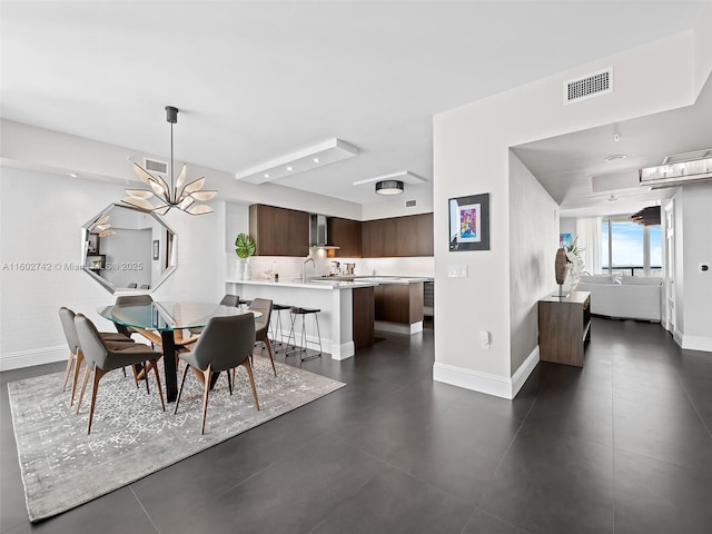 333 Las Olas Way Unit 3603, Fort Lauderdale, FL 33301 - dining area featuring an inviting chandelier and sink