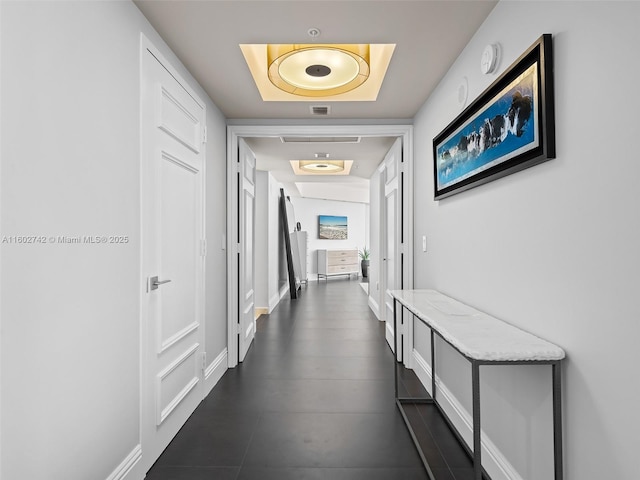 333 Las Olas Way Unit 3603, Fort Lauderdale, FL 33301 - corridor featuring a raised ceiling