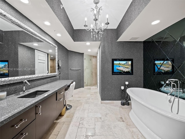 bathroom featuring vanity and plus walk in shower