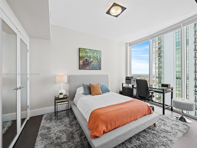 333 Las Olas Way Unit 3603, Fort Lauderdale, FL 33301 - bedroom featuring a wall of windows
