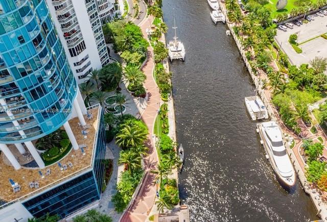 birds eye view of property featuring a water view