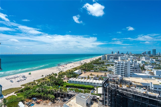 aerial view featuring a water view and a view of the beach