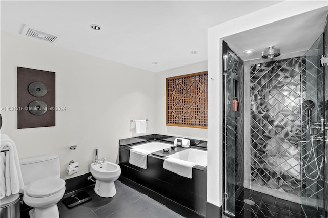 bathroom with a bidet, a shower with shower door, toilet, and tile patterned floors