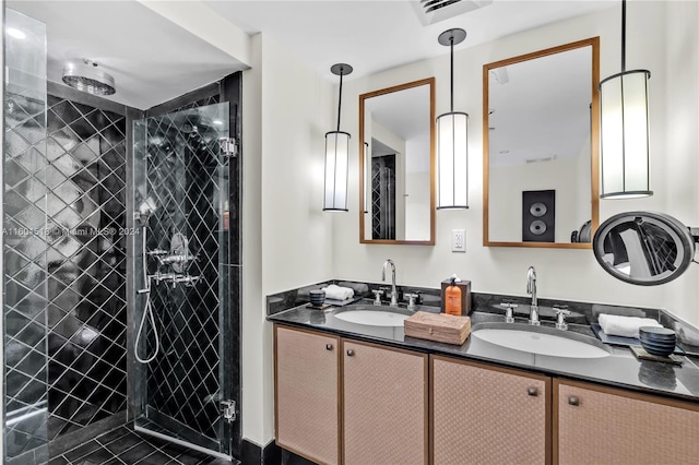 bathroom featuring walk in shower and vanity