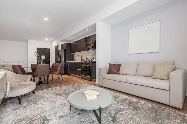 living room with light hardwood / wood-style floors