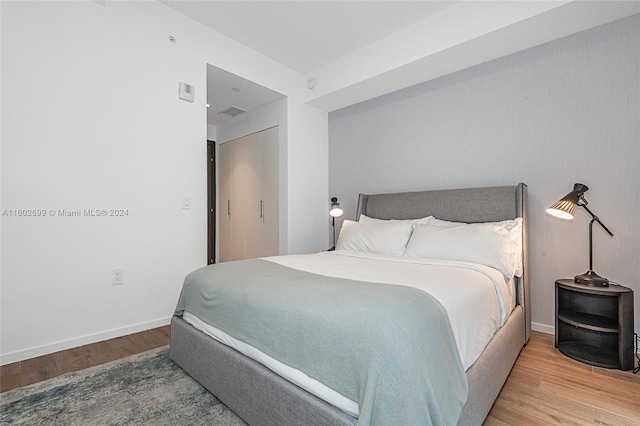 bedroom featuring light hardwood / wood-style floors