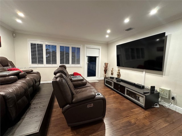 living room with dark wood-type flooring and crown molding