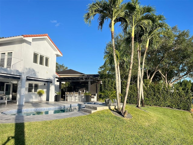 view of yard featuring a pergola and a patio