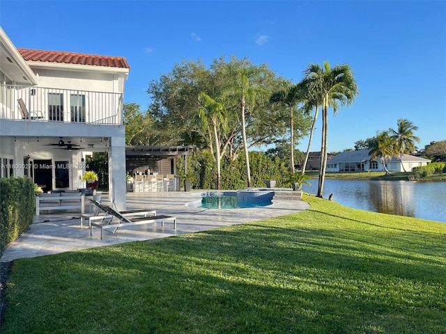 view of pool with a patio area, a lawn, a water view, a pergola, and ceiling fan