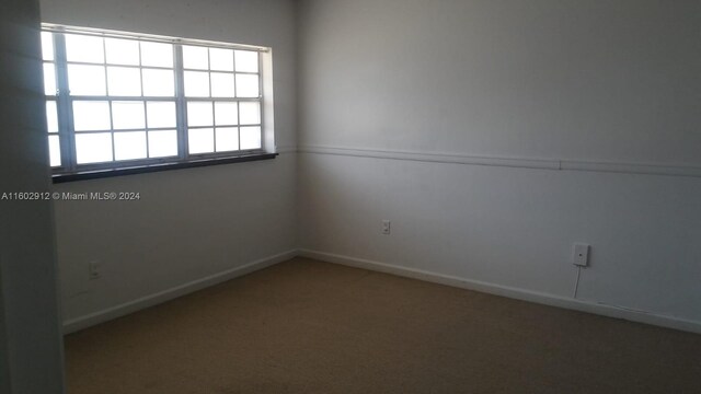 view of carpeted spare room