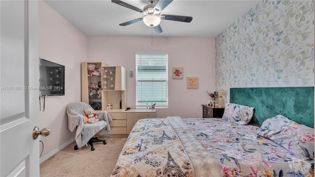 bedroom featuring ceiling fan and light colored carpet