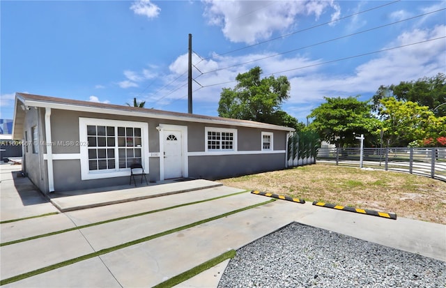 view of front of property featuring a patio