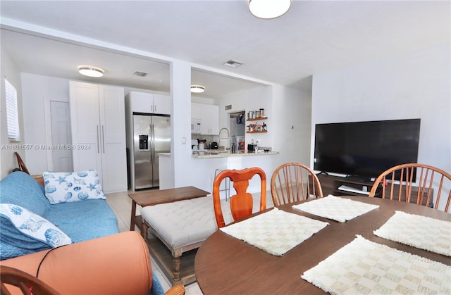 dining area featuring light hardwood / wood-style floors