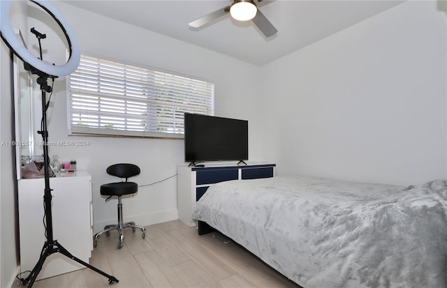 bedroom featuring ceiling fan and light hardwood / wood-style flooring