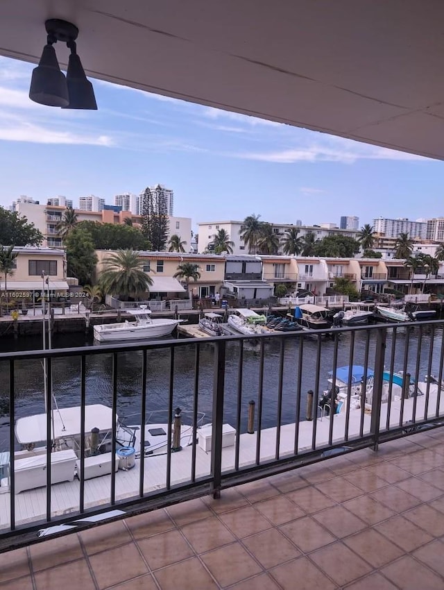 balcony featuring a water view