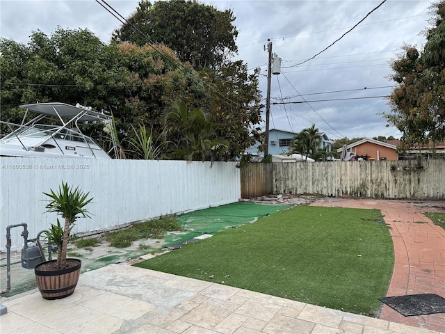 view of yard featuring a fenced backyard