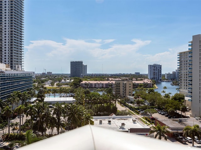 property's view of city featuring a water view