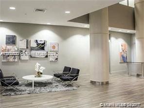 building lobby featuring visible vents