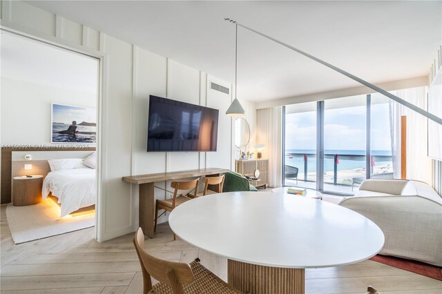 dining room featuring light parquet floors