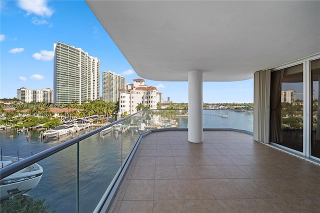 balcony featuring a water view