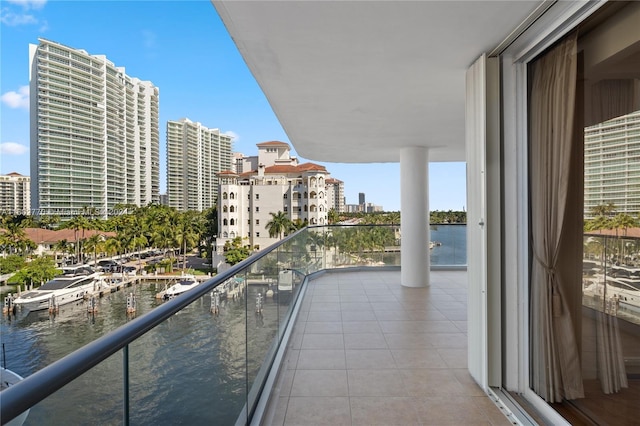 balcony featuring a water view