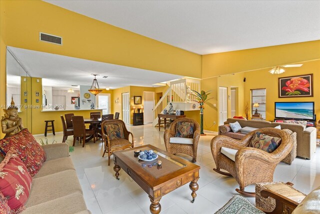 living room with light tile patterned flooring