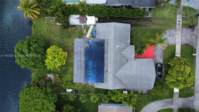 drone / aerial view with a water view