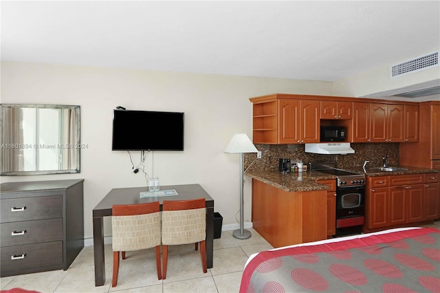 kitchen featuring electric stove, tasteful backsplash, light tile patterned floors, range hood, and sink