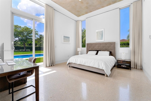 bedroom featuring multiple windows