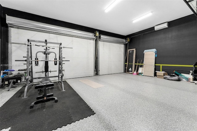 workout area featuring a wall unit AC