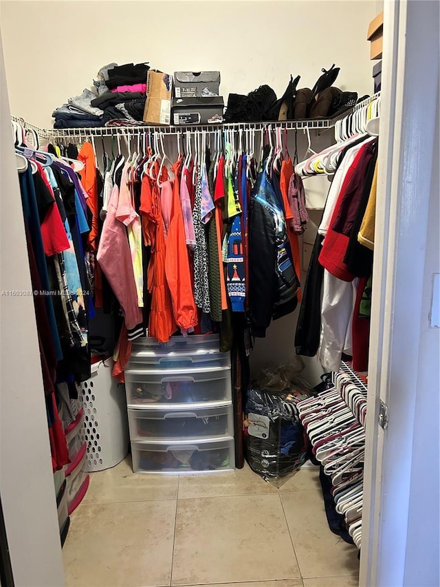 spacious closet with tile patterned flooring