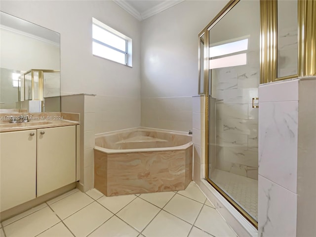 bathroom with tile flooring, ornamental molding, oversized vanity, and independent shower and bath