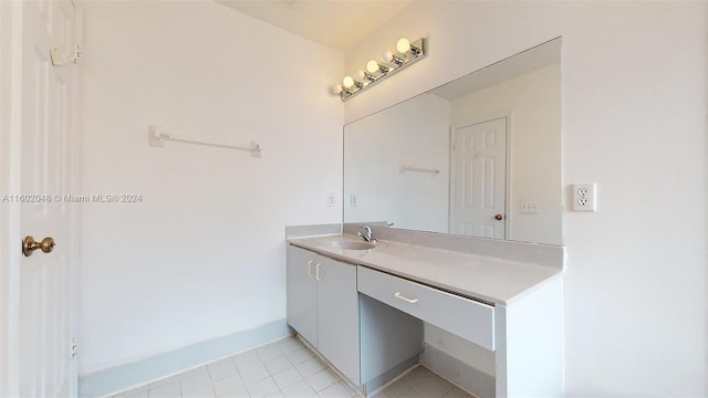 bathroom with vanity and tile patterned flooring