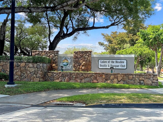 view of community sign