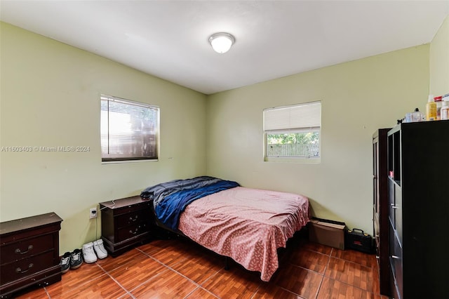 bedroom featuring wood-type flooring