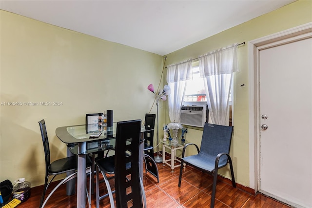 dining area with hardwood / wood-style flooring