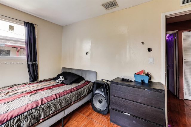 bedroom with tile flooring