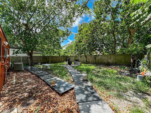 view of yard featuring central AC