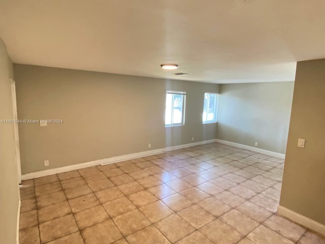 view of tiled spare room