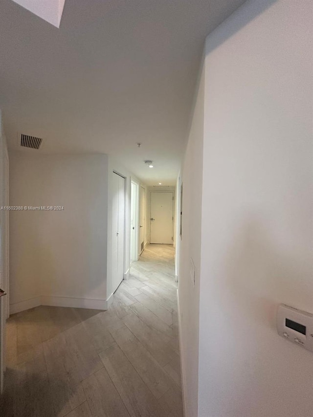 hall featuring light wood-type flooring