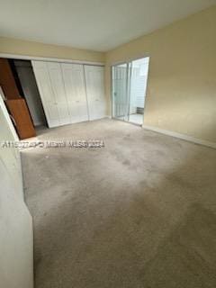 unfurnished bedroom with a closet