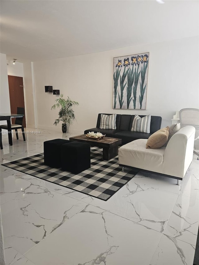 living room with tile flooring